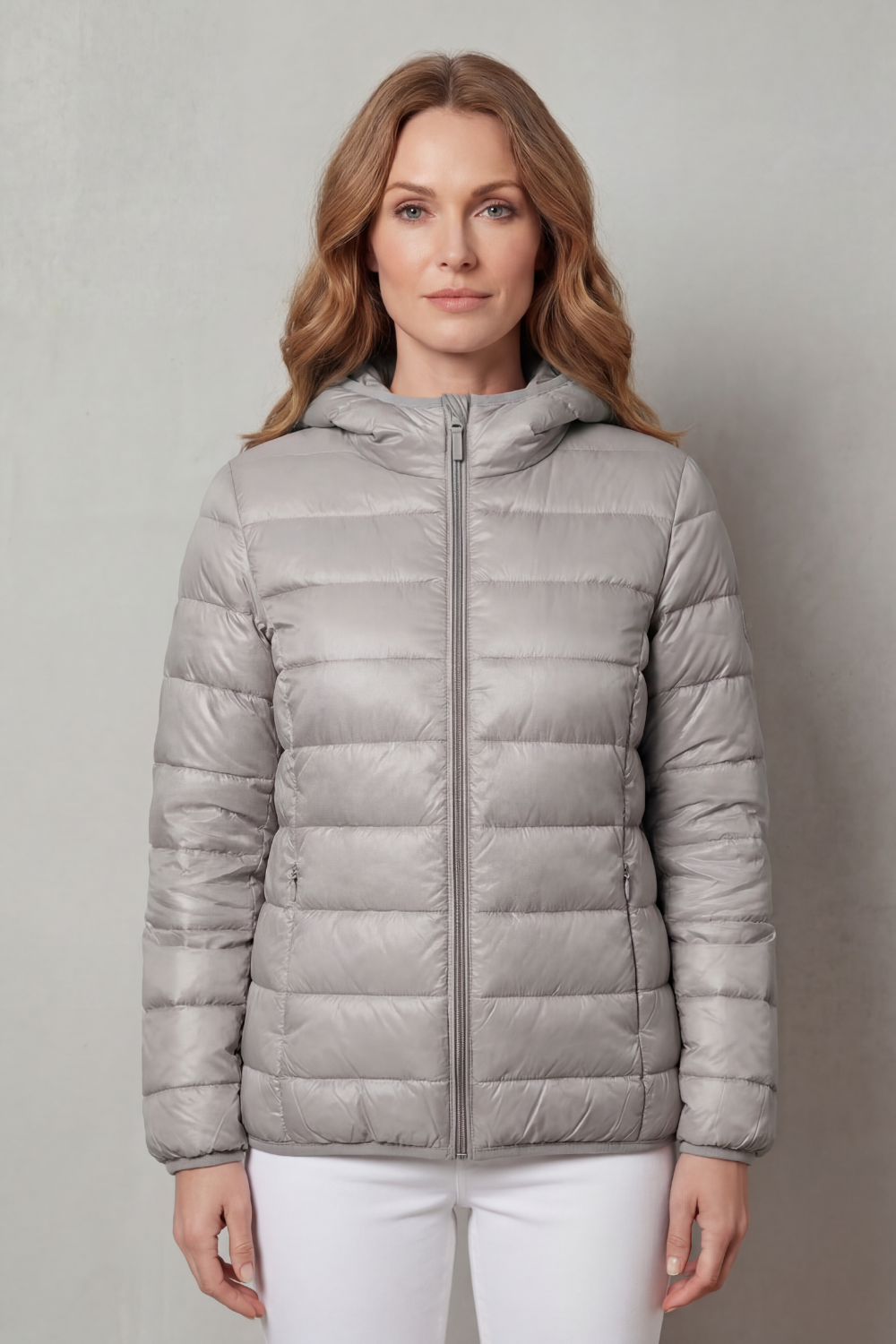 Light gray hooded puffer jacket with quilted pattern and full-zip front