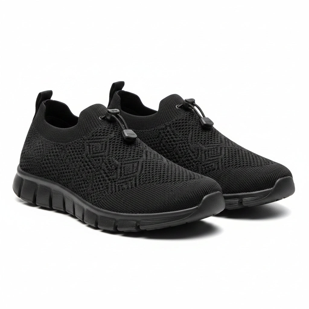 Black knit slip-on shoes with wide toe box and white cushioned sole
