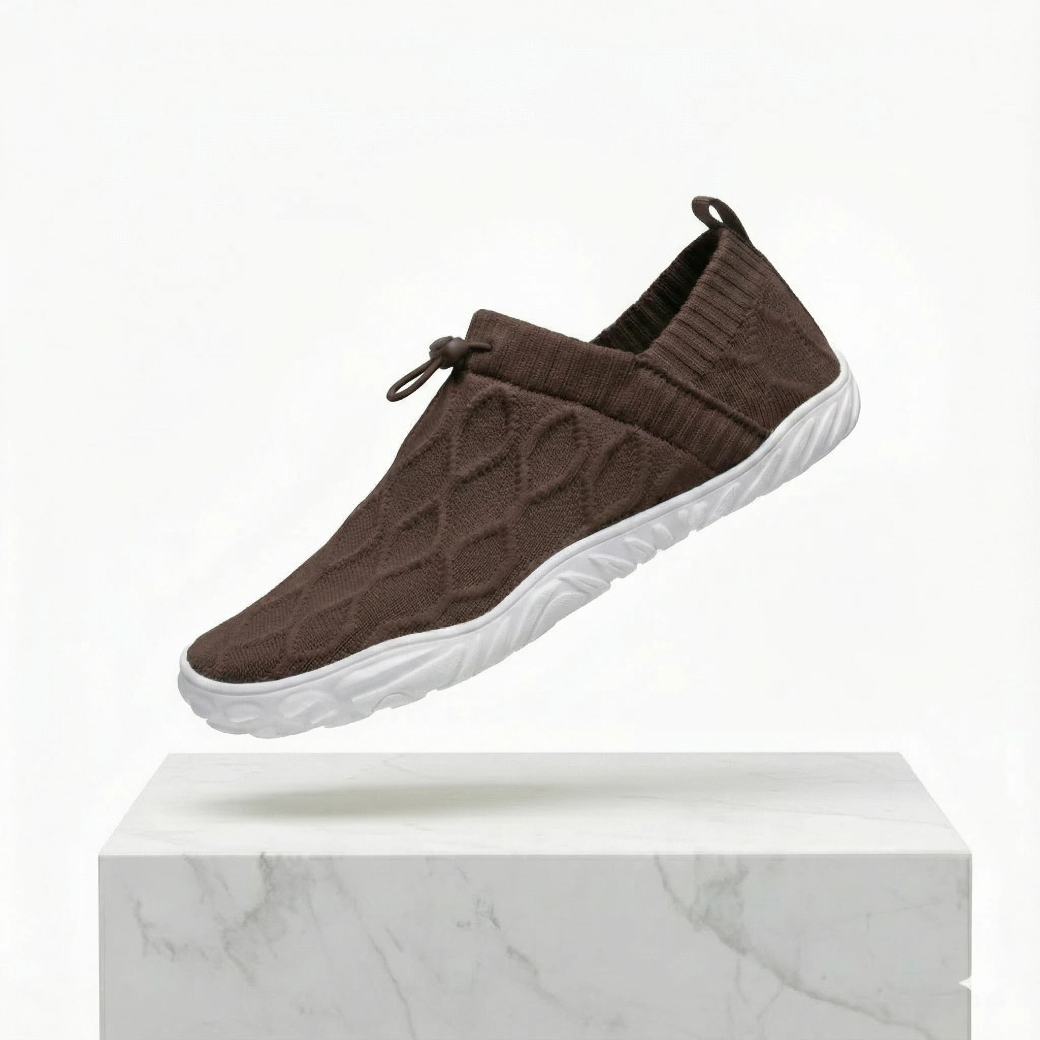 Dark brown knit slip-on shoes with wide toe box, stretch collar, white tread sole
