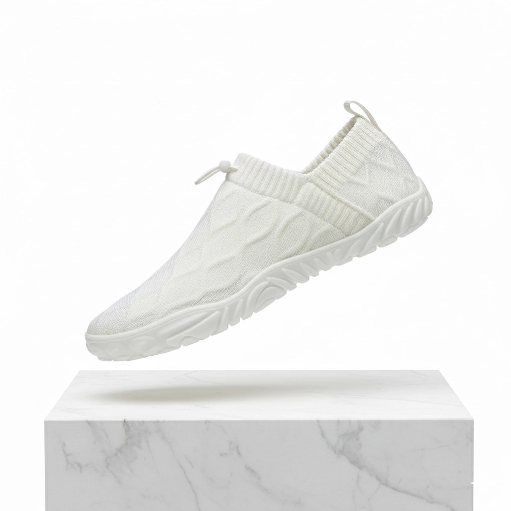 White knit slip-on shoes with wide toe box, elastic collar, white tread sole