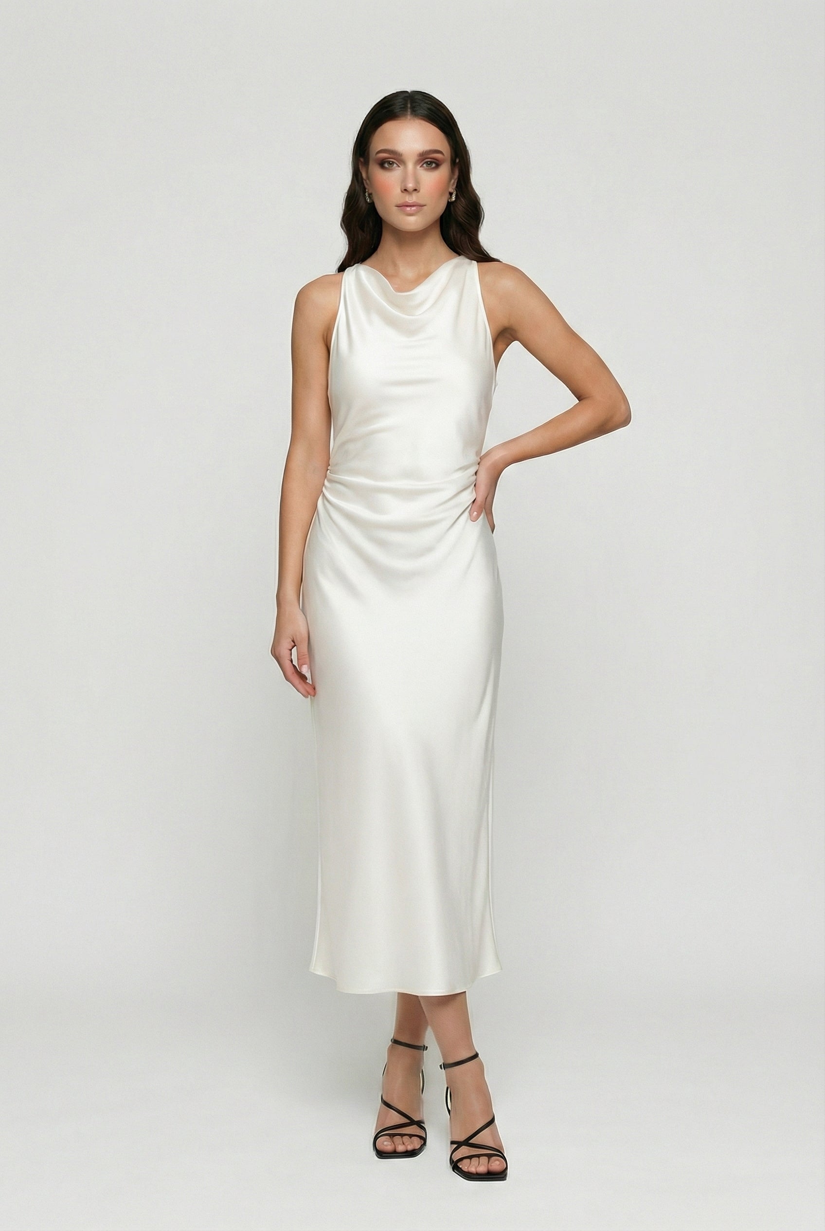 White cowl-neck ruched satin midi dress, sleeveless with draped neckline