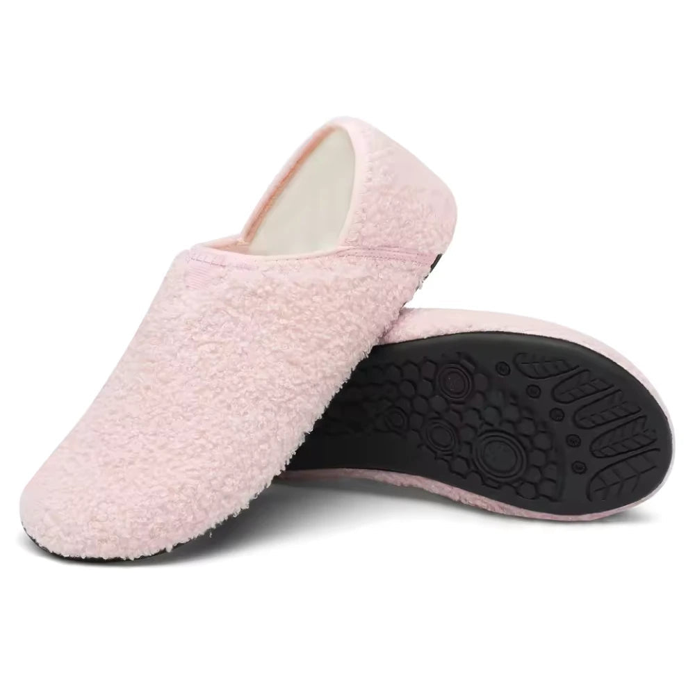 Light pink plush slip-on barefoot slippers with black textured outsole