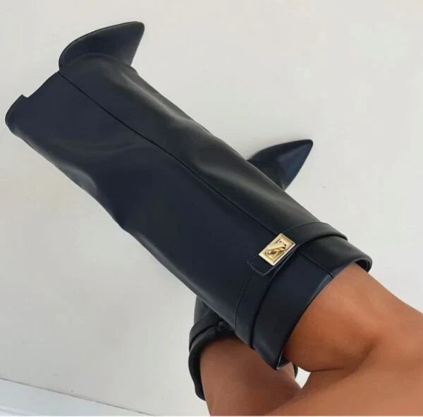 Black leather tall heeled boots with gold buckle; low-angle side view.
