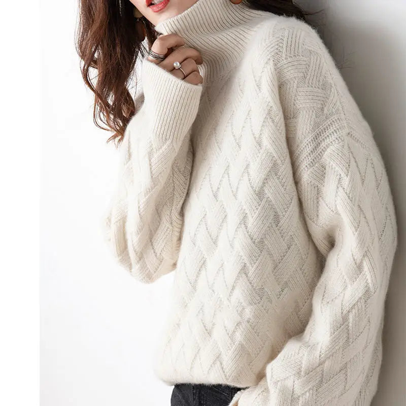 Cream cable-knit turtleneck sweater with long sleeves and diamond pattern