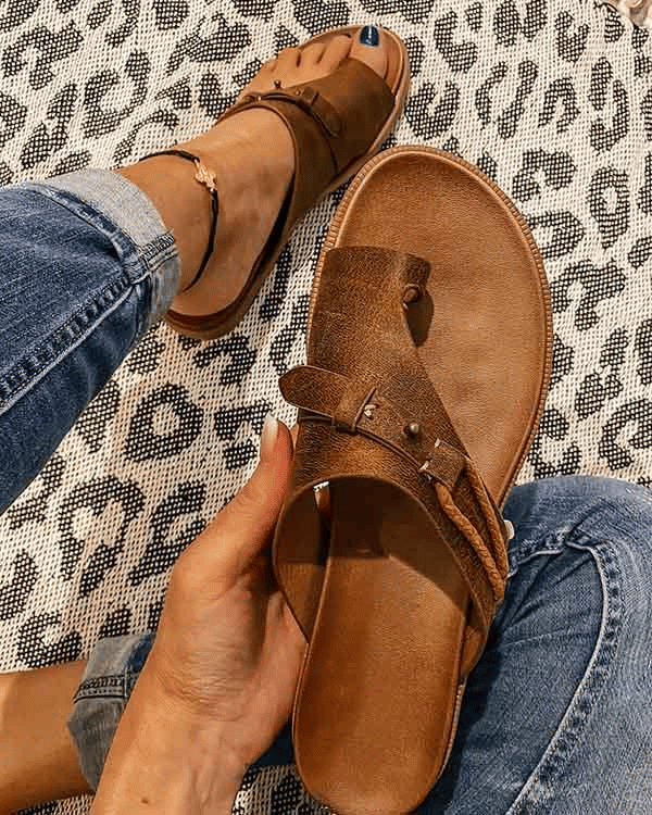 Brown women's open-toe comfort sandals with adjustable ankle strap and cushioned sole