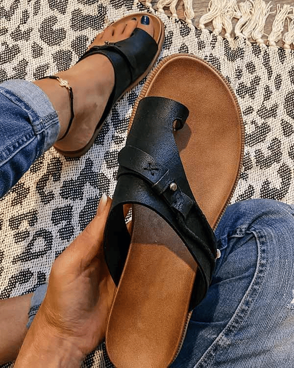 Black women's open-toe comfort sandals with adjustable ankle strap and cushioned footbed