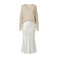 Silk skirt set in light beige/white with V-neck top and long flowing skirt