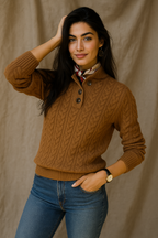 Warm brown cable-knit sweater with buttoned collar and ribbed cuffs