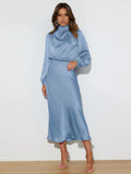 Light blue long-sleeve satin evening dress with high neck and midi pencil fit