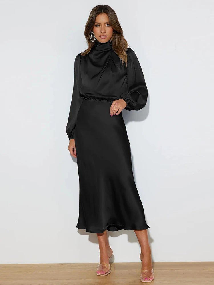 Black long-sleeve satin midi dress with high neck and fitted, gently flared skirt