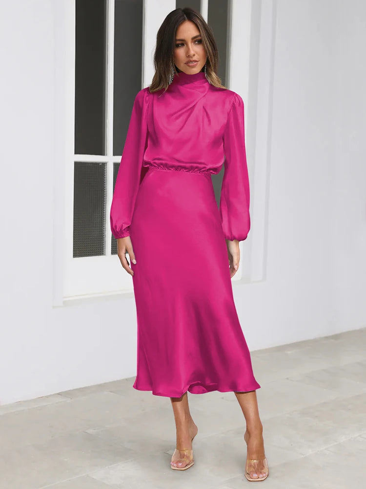 Hot pink long-sleeve satin midi dress with high neck and gathered waist