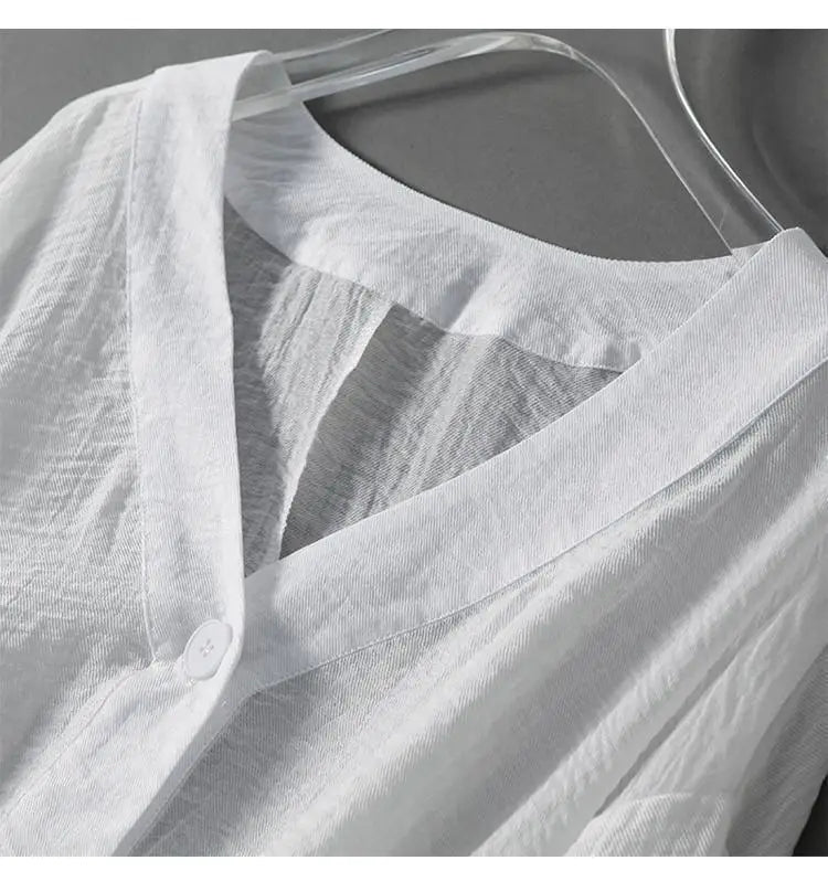 White linen blouse V-neck and placket with small front buttons