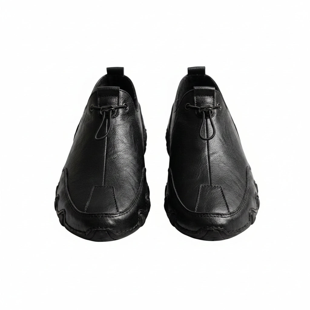 Black leather casual sneaker with lace-up and stitched toe panel.