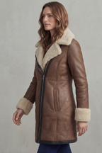 Brown leather winter coat with shearling-trimmed collar and cuffs, zip front, side view