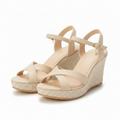 Beige cushioned platform wedge sandals with double ankle straps and buckle detail