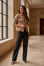 Camel button-down knit cardigan sweater with black stripe bands and front buttons