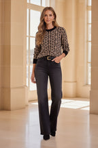 Black pullover sweater with bold geometric Greek-key pattern and crew neckline