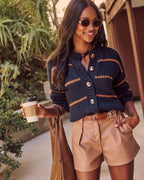Clement button-down cardigan, dark navy knit with camel and orange horizontal stripe bands