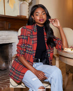 Women’s plaid blazer with padded shoulders, red multi check pattern, open front, long sleeves.