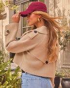 Cropped khaki knit jacket with flap pockets, double buttons, and wide collar