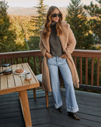 Tan teddy coat with open front, side pockets, long sleeves, relaxed fit