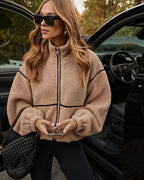 Beige shearling jacket with contrast piping, full-zip and stand collar