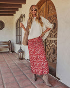 Ivory oversized knit pullover sweater with dropped shoulders and ribbed cuffs