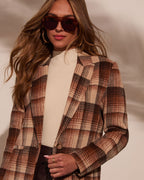 Women's plaid blazer with padded shoulders, tan and brown multi plaid, lapel close-up