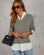 Grey V-neck pullover sweater with white poplin shirt placket and hem