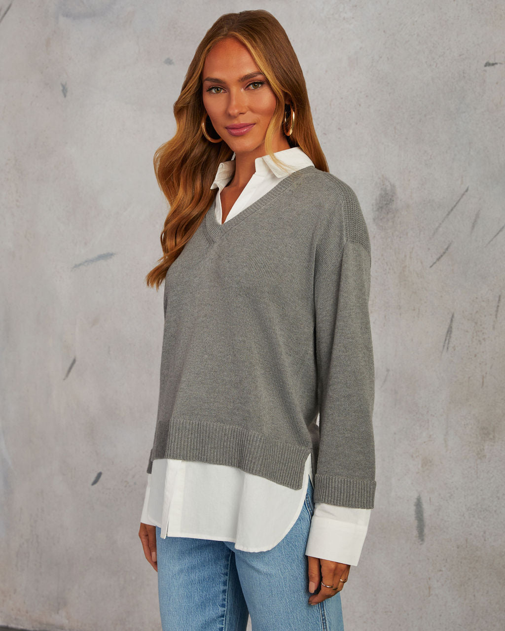Grey V-neck pullover sweater with white contrast yoke and shirt hem