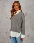 Grey V-neck pullover sweater with white contrast yoke and shirt hem