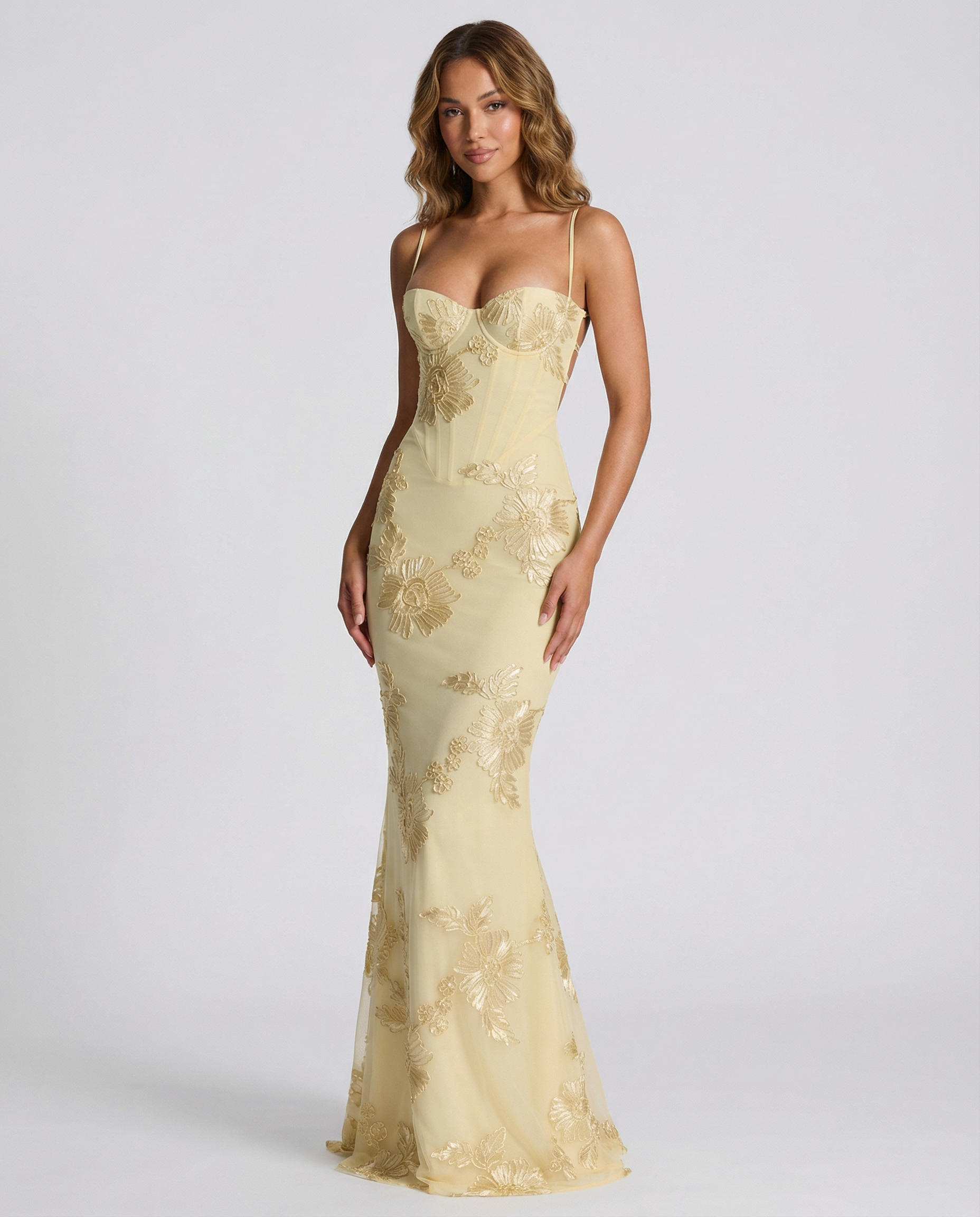 Floral evening dress in lemon yellow with spaghetti straps and fitted mermaid silhouette