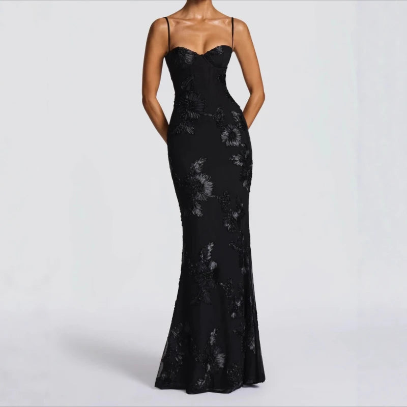 Floral evening dress in black with thin straps and fitted mermaid silhouette