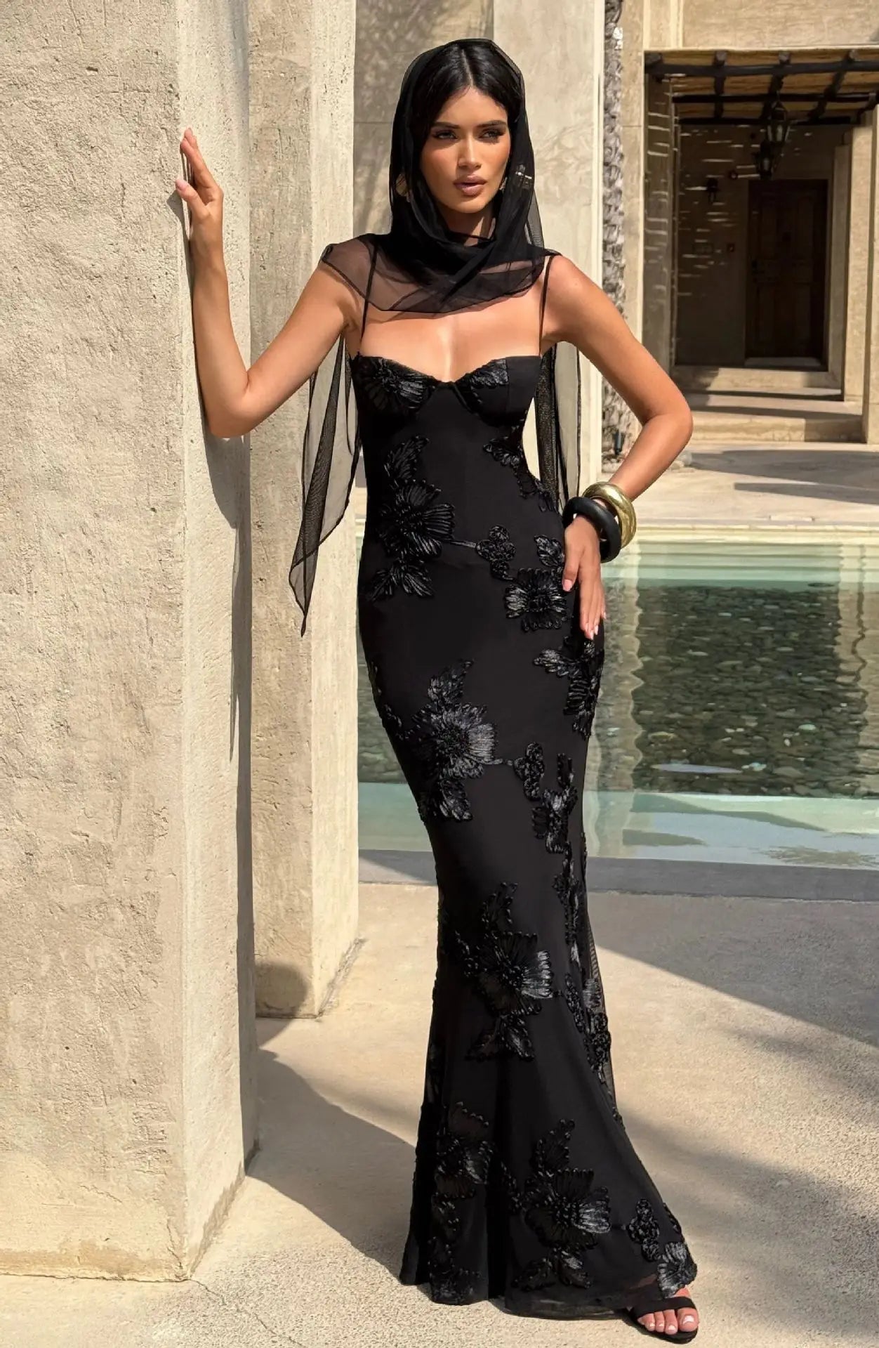 Black floral evening dress with spaghetti straps and open back, mermaid silhouette