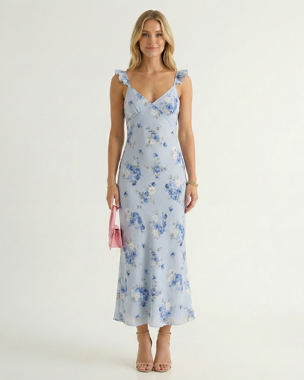 Blue floral midi sundress with V-neck, spaghetti straps, and backless design