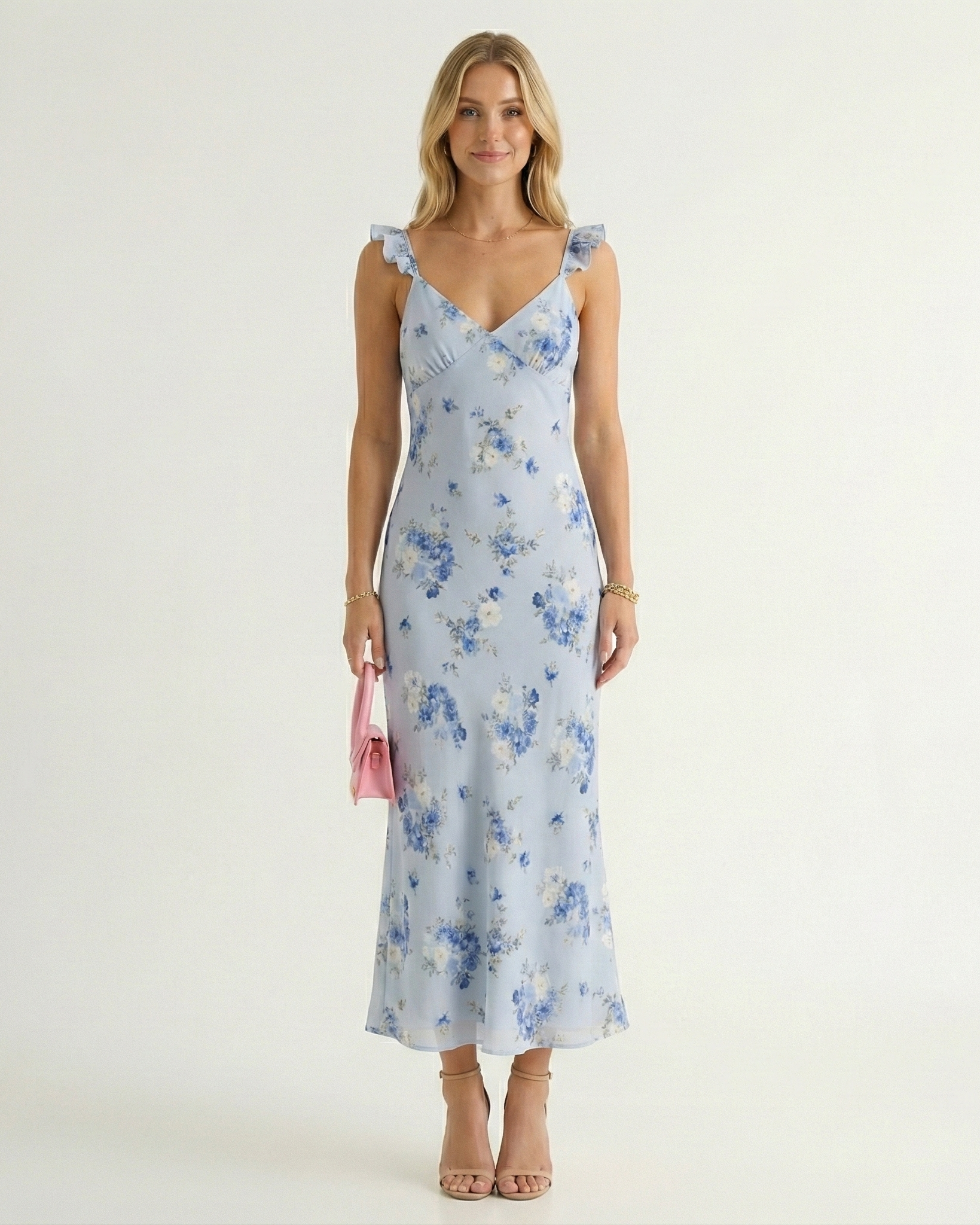 Blue floral midi sundress with V-neck, spaghetti straps, and backless design