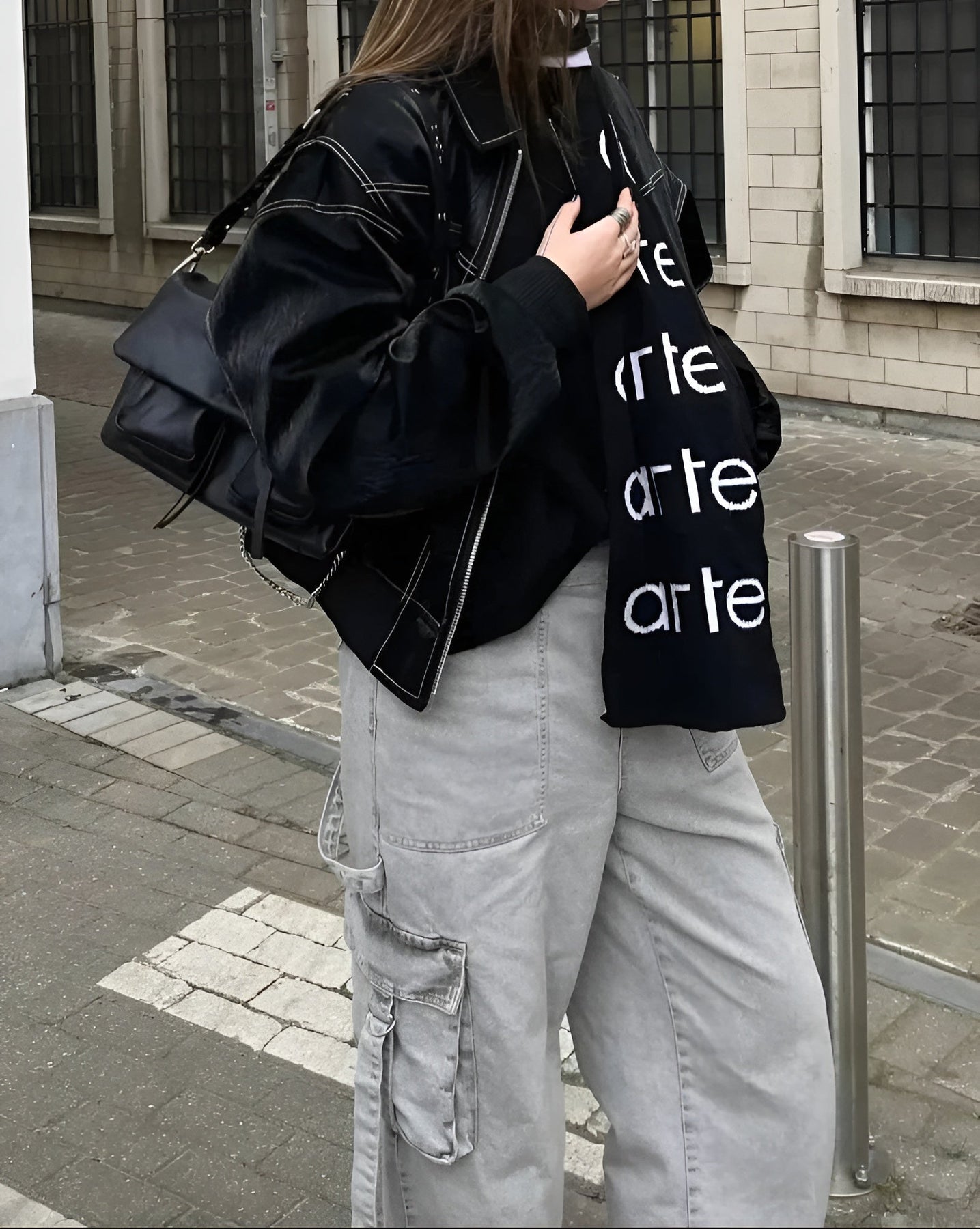 Black oversized zip bomber jacket with contrast seam stitching and stand collar