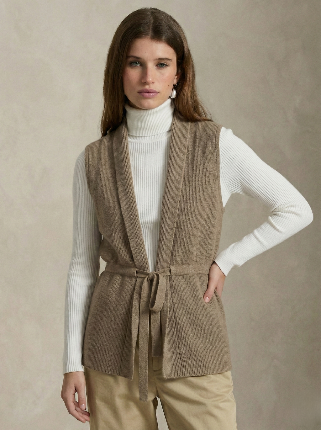 Camel merino wool belted sweater vest with V-neck and waist tie, front buttonless design.