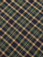 Plaid fabric with navy, tan, and green grid checks