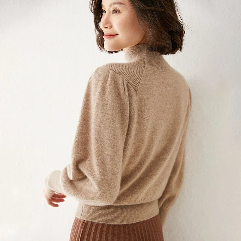 Camel merino turtleneck sweater with puff sleeves and ribbed neckline