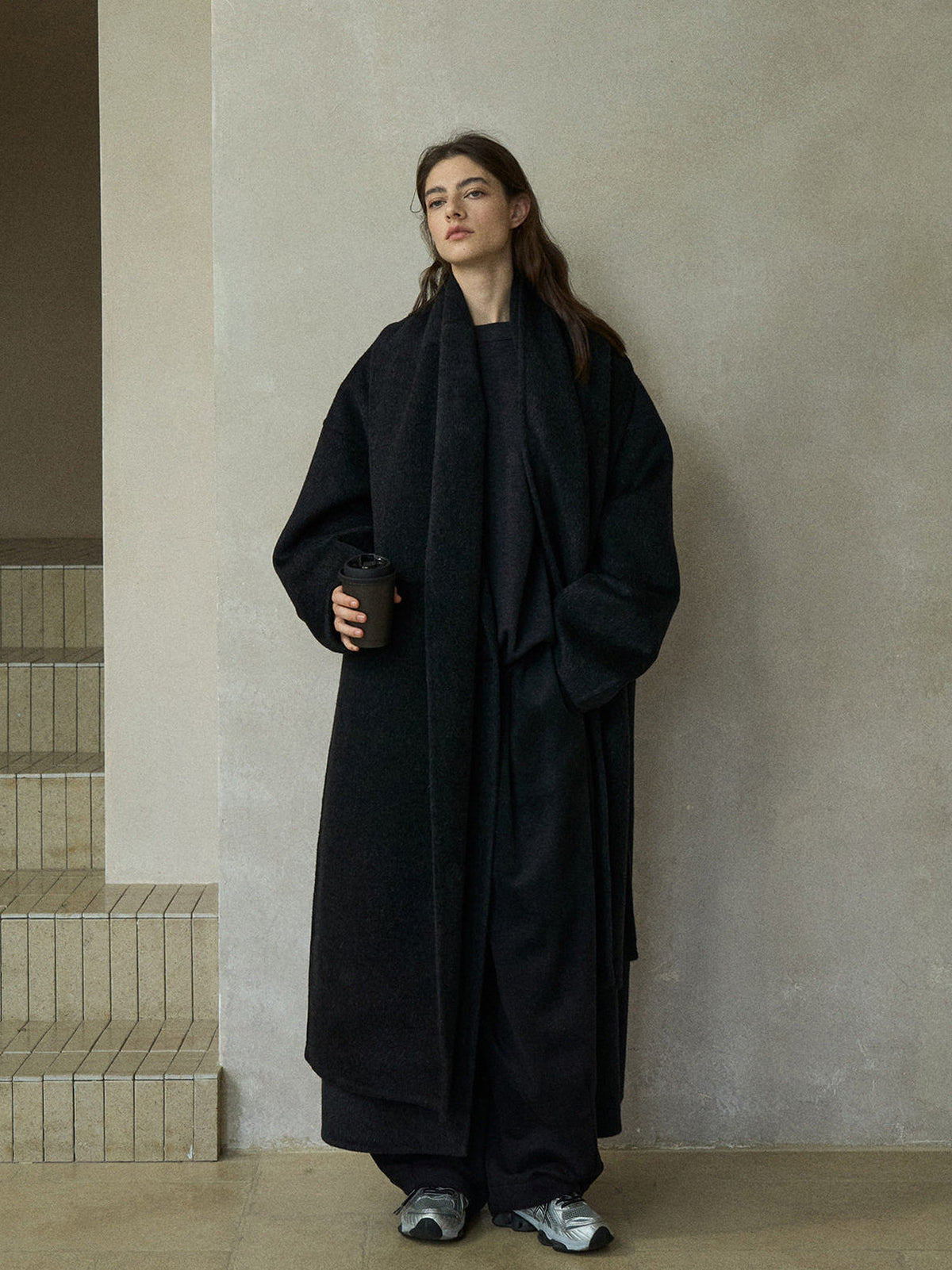 Black wool wrap coat with matching scarf, open front and relaxed fit