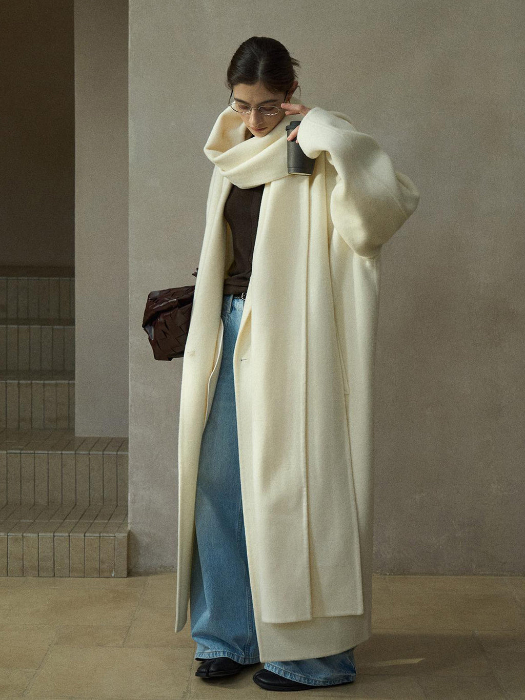 Cream wool wrap coat and matching scarf, open front over jeans