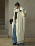 Cream wool wrap coat and matching scarf, open front over jeans