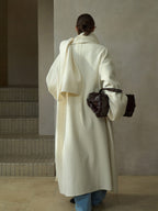 Cream wool wrap coat with matching scarf, back view with scarf over shoulders