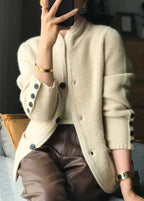 Cream white cardigan with front buttons and wide sleeves, knit texture, mid-length