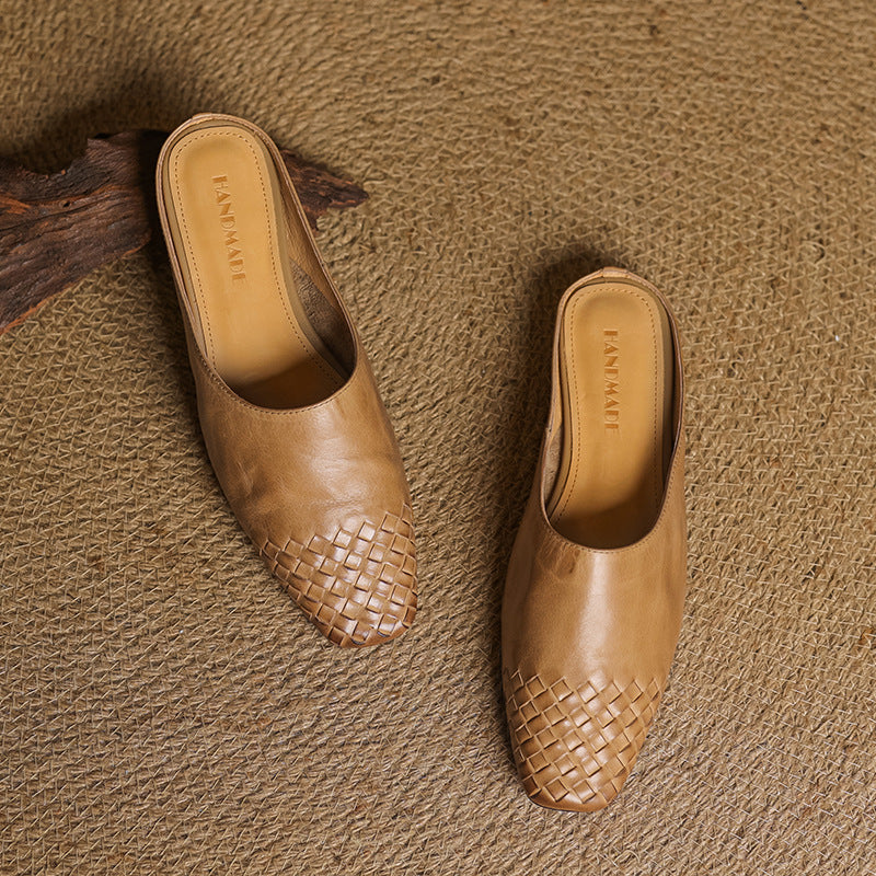 Tan/brown leather mules with woven toe, open top, low heel, side view