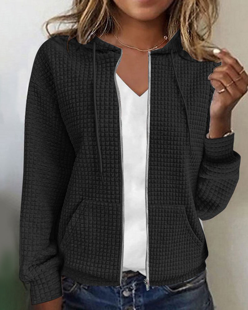 Black textured zip-up long-sleeve hoodie with front pockets and high collar
