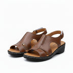 Women’s leather comfort wedge sandals in brown with open toe and ankle chain strap