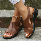 Women’s leather comfort wedge sandals in brown with open toe and gold ankle chain