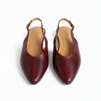 Wine red genuine leather pointed-toe flats, one pair shown with interior lining